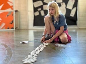Student assembles work at private middle school.