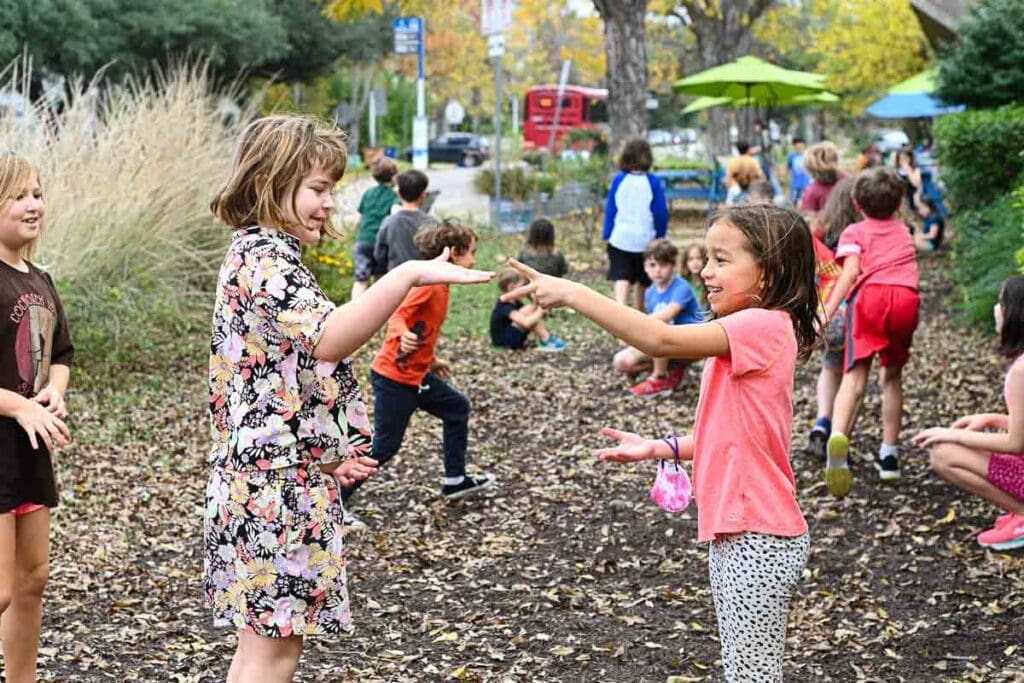 Why AHB valued Micro school kids play game outdoors.