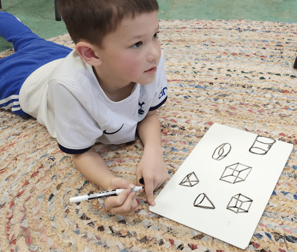 Kindergarten student draws 3d figures at private school in Austin.