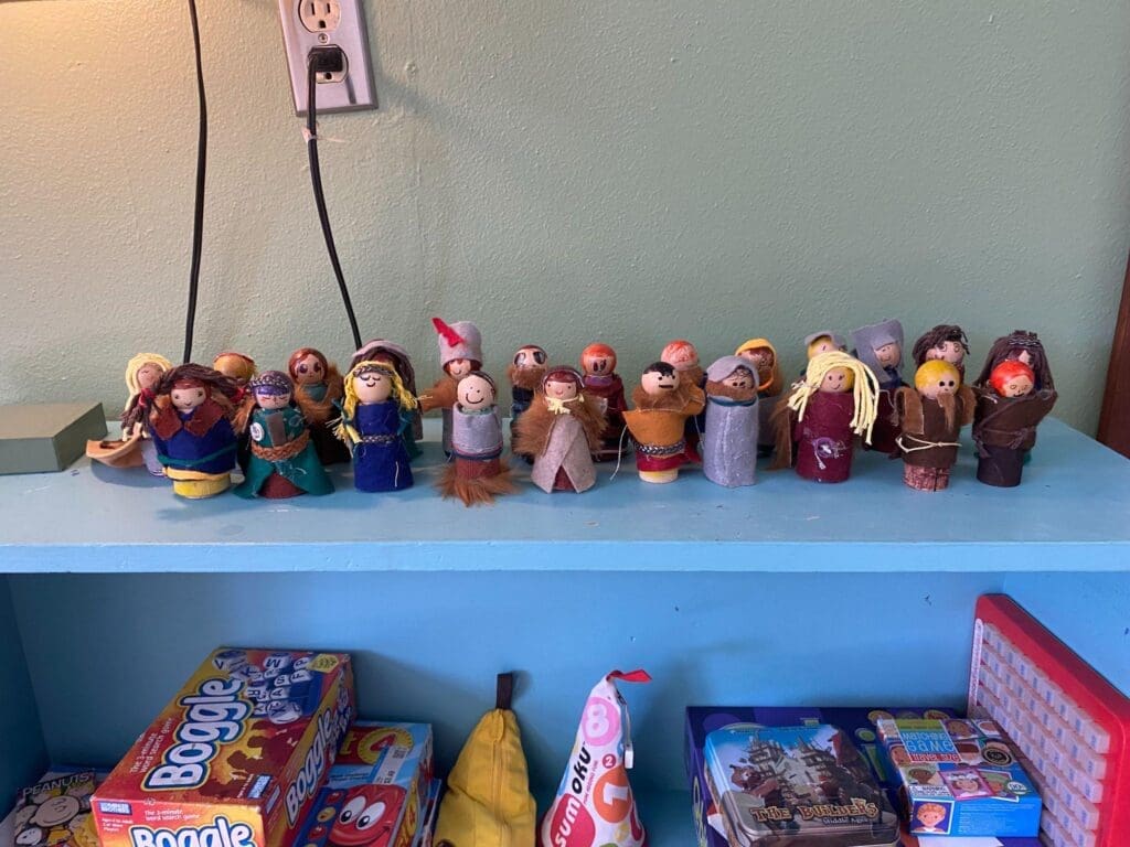 Display of small figurines at project based school.