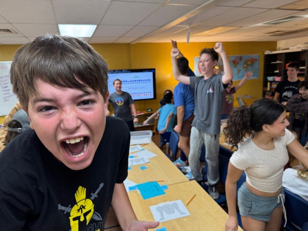 Middle school students celebrate at part time school.
