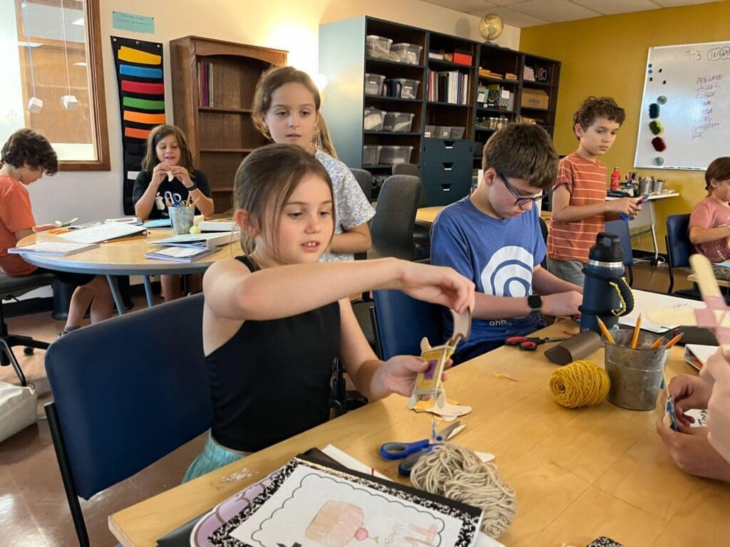 Students work on geography at project-based school.