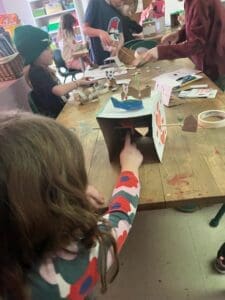 student demonstrates work at project based school.