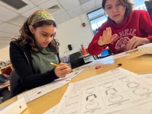 Middle school students study together at private school in Austin.
