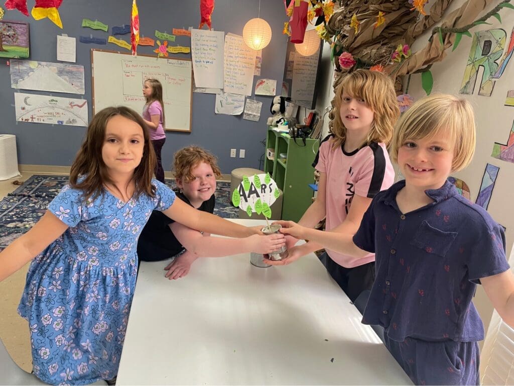 Elementary students proudly display work at private school in Austin.